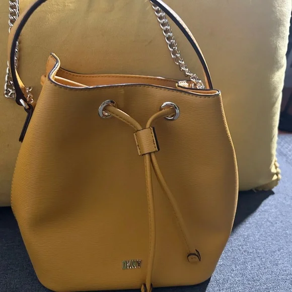 Mustard color DKNY mini hand bag. Gently used (2x)send me an offer please!! - Picture 3 of 8